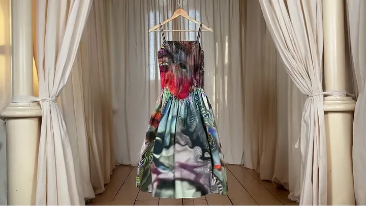 Roberts|Woods 'Magic Pleats' dress on a hanger, engineered digital print pleated by hand
